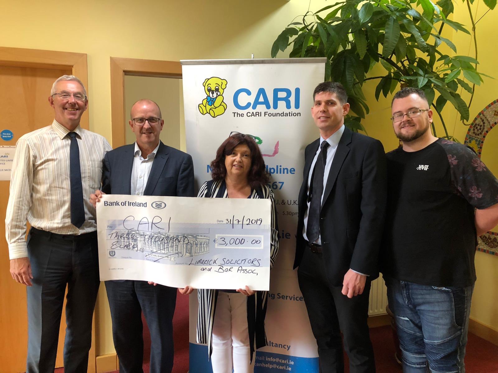 Limerick solicitors present €3,000 to child sex abuse charity