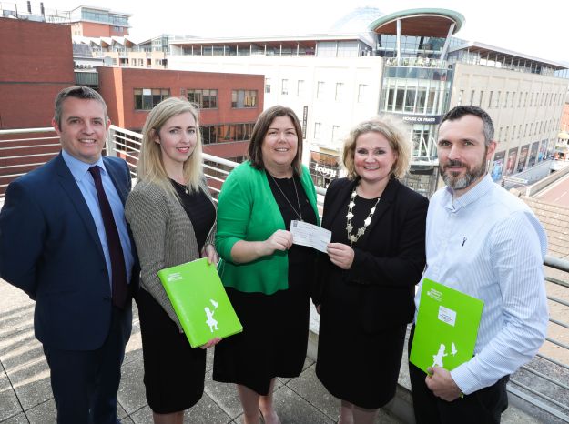 NI: Over £2,000 raised by immigration solicitors presented to Barnardo's